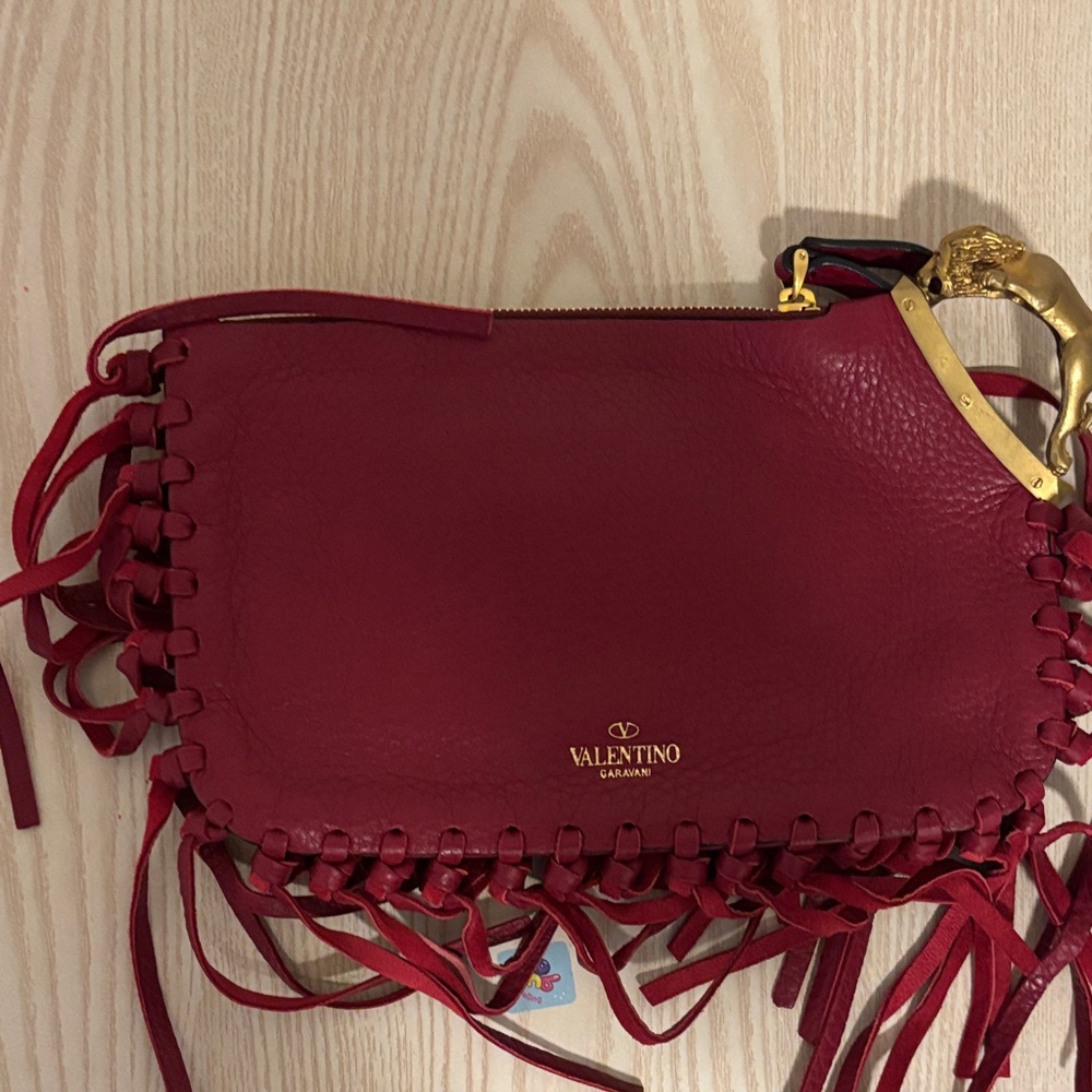 Valentino Garavani Burgundy Leather Fringe Clutch